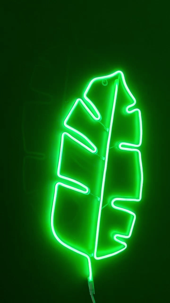 Tropical leaf neon decor